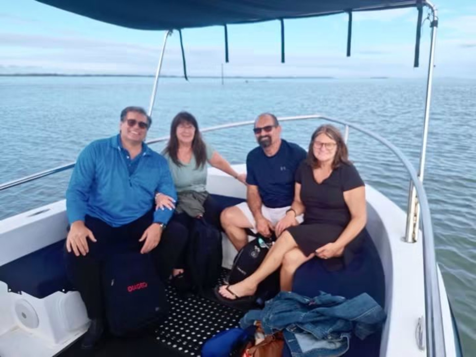 Guests travelling by private Fiji water taxi to a Mamanuca Island resort