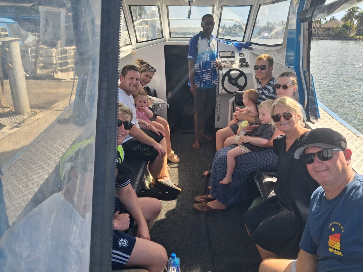 Family group aboard a Bluewave Fiji private water taxi