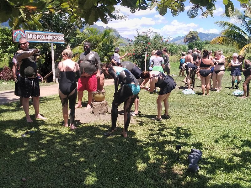 Guests applying mud at the Tifajek Mud Pool & Hot Spring in Nadi Fiji