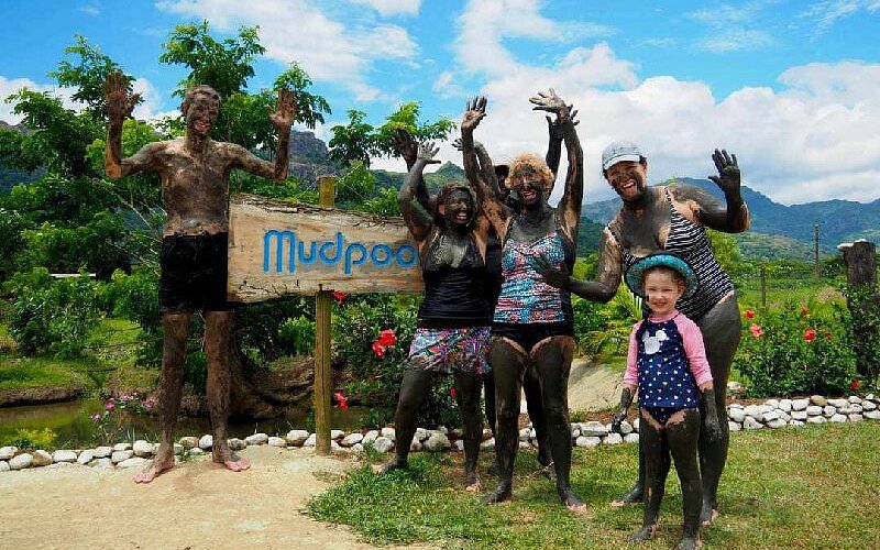 Visitors enjoying mud wrap at Tifajek Hot Springs in Sabeto, Fiji